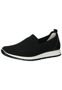 Černé slip-on boty s pleteným textilním svrškem, bílou mezipodešví a texturovanou černou patou. Mají minimalistic design a elastické strany pro flexibilitu.