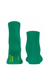 Calze alla caviglia verdi realizzate in materiale elasticizzato, con una texture a coste e lettering giallo del marchio sul lato.