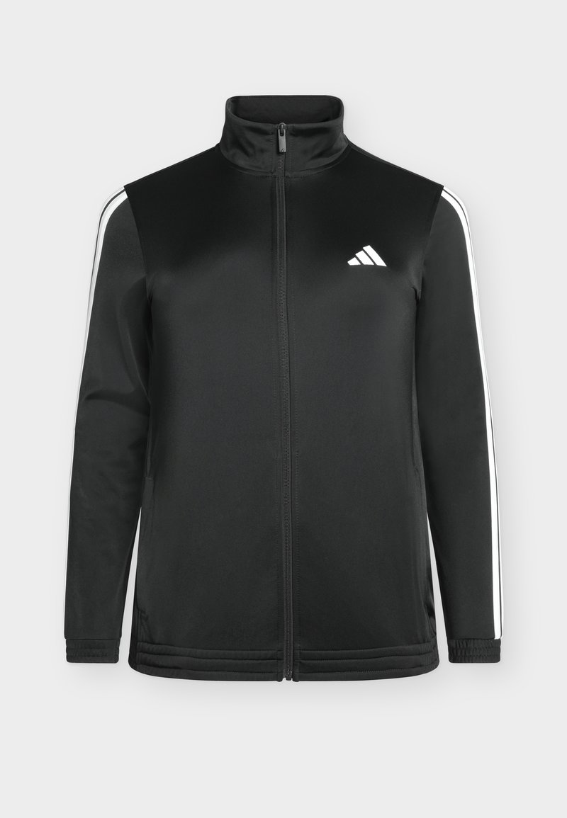 Svart sportjakke med hel glidelås, hvite striper på ermene og lite hvitt logo på brystet, stående mot en ensfarget bakgrunn.