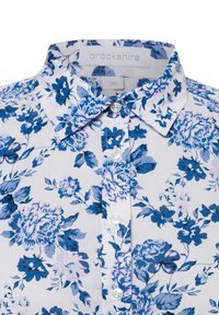 Koszula z guzikami, wykonana z białej tkaniny w niebieskie i różowe kwiatowe wzory. Zawiera klasyczny kołnierzyk i przezroczyste guziki. Widoczna etykieta rozmiaru.