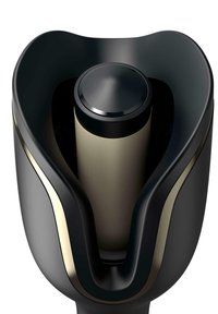 Schwarzes und goldenes elektronisches Gerät mit einem glatten, abgerundeten Design; verfügt über einen glänzenden oberen Knopf und ein zentrales zylindrisches Element.