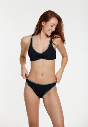 Black bikini set featuring a bralette top with green accents and a gathered center, alongside matching low-rise bottoms with contrasting trim.