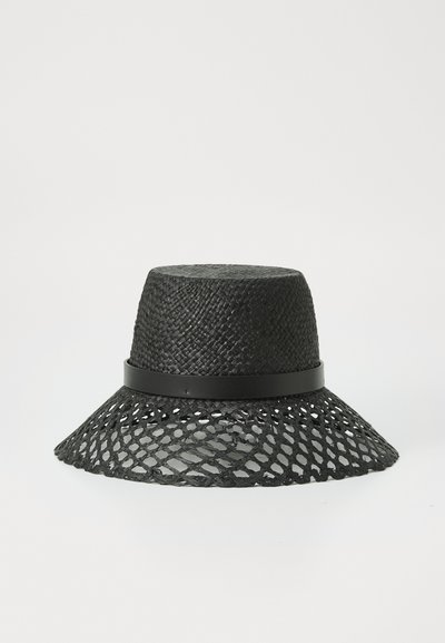 Black straw hat with a wide, lacy brim and a solid black band. Textured weaving pattern throughout. Round crown, lightweight design.