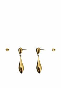 Pendientes de gota de oro con forma de lágrima y acabado pulido. Presentan un pequeño cierre de tuerca y un acento de diamante en el punto de conexión.