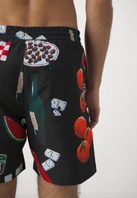 Carhartt WIP SLATER SWIM TRUNKS - Bañador corto - isis maria dinner/black