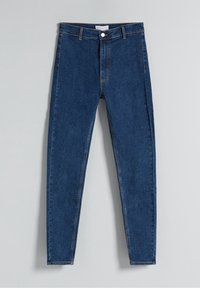 Jeans ajustados en denim azul oscuro con una textura suave. Presenta un cierre con botón en la parte delantera y costuras sutiles a lo largo de las costuras.