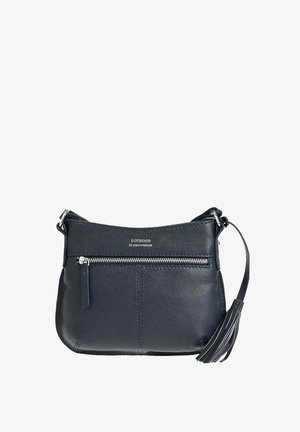 Sac bandoulière en cuir bleu marine avec poche zippée sur le devant, matériel en argent, détail en frange sur la sangle et logo "Loxwood Le Cabas Parisien".