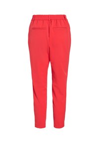 Κόκκινο παντελόνι με ελαστική μέση, σχεδιασμό με ψηλό και στενό πόδι και δύο πίσω τσέπες. Κατασκευασμένο από λεία, ελαφριά υφάσματα με μονόχρωμο χρώμα.