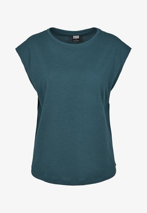 Teal kortärmad t-shirt med rund halsringning, lös passform och sidoklipp, tillverkad av mjukt bomullstyg. Har en etikett inuti.
