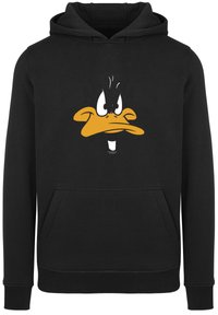 Čierna mikina s kapucňou so zlatou a bielou karikatúrnou tvárou kačice vytlačenou na prednej strane. Má klokaní vrecko a rebrované manžety.