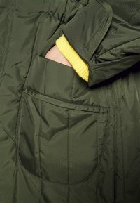 DESIGNERS REMIX Vinterfrakke - green