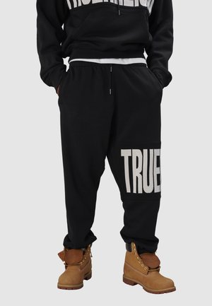 Tracksuit bottoms - black