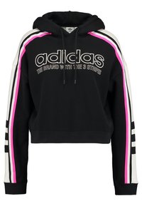 Black cropped hoodie with white, pink, and black striped accents along the sleeves. Features a drawstring hood and bold logo text.