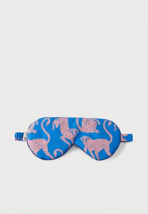Blue sleep mask with pink spotted monkey illustrations and an elastic strap on a white background.