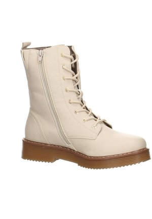 Botte beige mi-mollet à lacets avec fermeture éclair latérale, bout rond et semelle épaisse marron rainurée, conçue pour un usage décontracté ou en plein air.