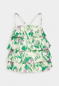 Robe sans manches à volants avec motif floral vert, blanc et lilas clair et fines bretelles sur fond uni.