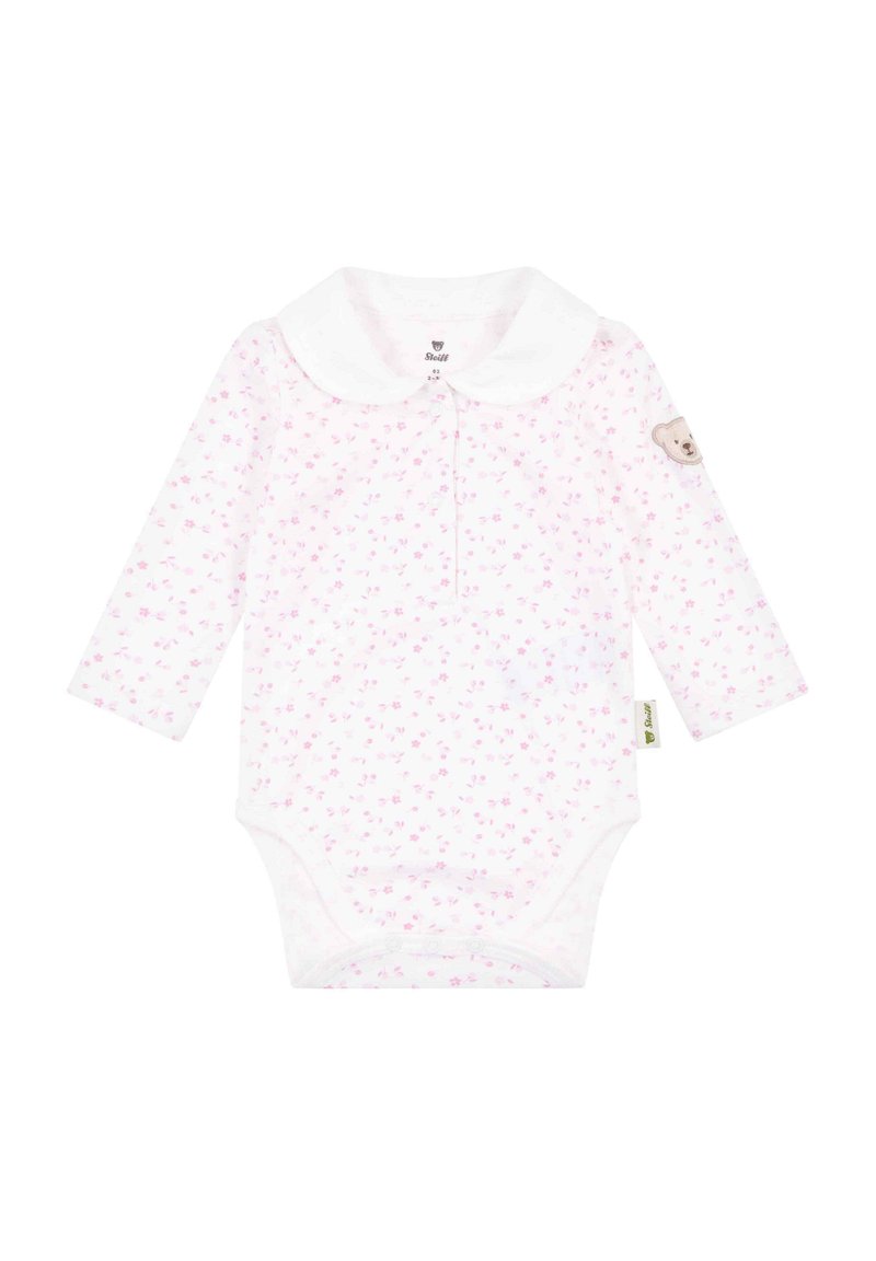 Tutina a maniche lunghe rosa con colletto bianco, dotata di un'appliqué a forma di orso sulla manica e chiusura a scatto sul fondo. Materiale in cotone morbido.