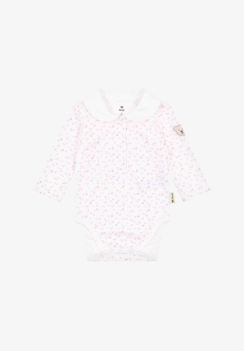 Roze bloemenlange mouw onsie met een witte kraag, met een berenpatch op de mouw en drukknoopsluiting aan de onderkant. Zachte katoenmaterialen.