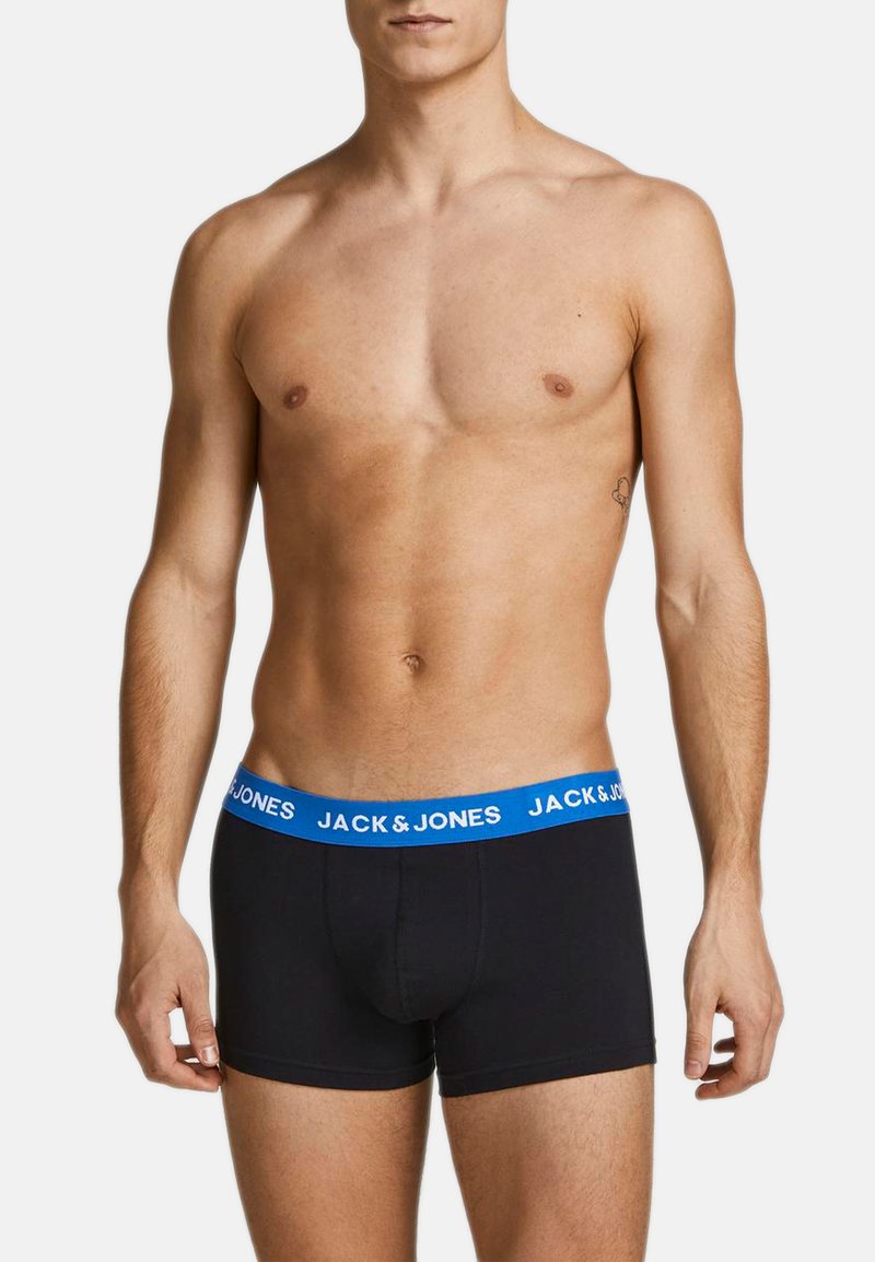 Boxer-briefs noirs en tissu extensible, avec une ceinture élastique bleue portant l'inscription "JACK & JONES" en blanc.