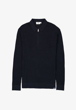Suéter de punto acanalado en navy con collar con cremallera. Presenta mangas largas, un dobladillo recto y una pequeña etiqueta de logo en el lado inferior izquierdo.