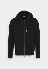 Svart zip-up hettegenser laget av bomullsblanding, med justerbar hette, frontlommer, ribbekantede mansjetter og en subtilt preget logo.
