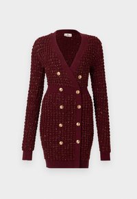 Cardigan lavorato a maglia bordeaux con scollo a V, maniche lunghe e bottoni dorati. Presenta un tessuto testurizzato e dettagli a coste sui polsini e sulla vita.