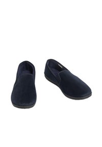 Scarpe slip-on blu navy con tomaia in tessuto strutturato, punta rotonda, rivestimento morbido e suola in gomma flessibile. Design leggero e minimale.