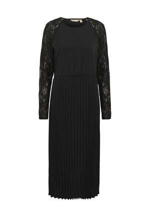 Schwarzes Kleid mit langen Spitzeärmeln, einem runden Ausschnitt und einem plissierten unteren Bereich. Hergestellt aus einem glatten Stoff, der eine kontrastierende Textur bietet.