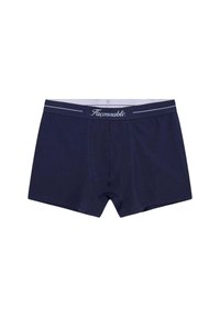 Boxer shorts en coton bleu marine avec une coupe ajustée. Dotés d'une taille élastique grise avec des rayures blanches et du logo "Faconnable". Texture douce.