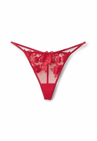 Tanga rojo de encaje con bordado floral en la parte delantera, paneles de malla transparente y parte trasera de tela sólida. Las correas ajustables completan el diseño.