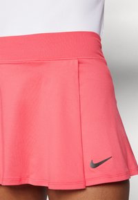 Nike Performance FLOUNCY - Falda de deporte - aster pink/black