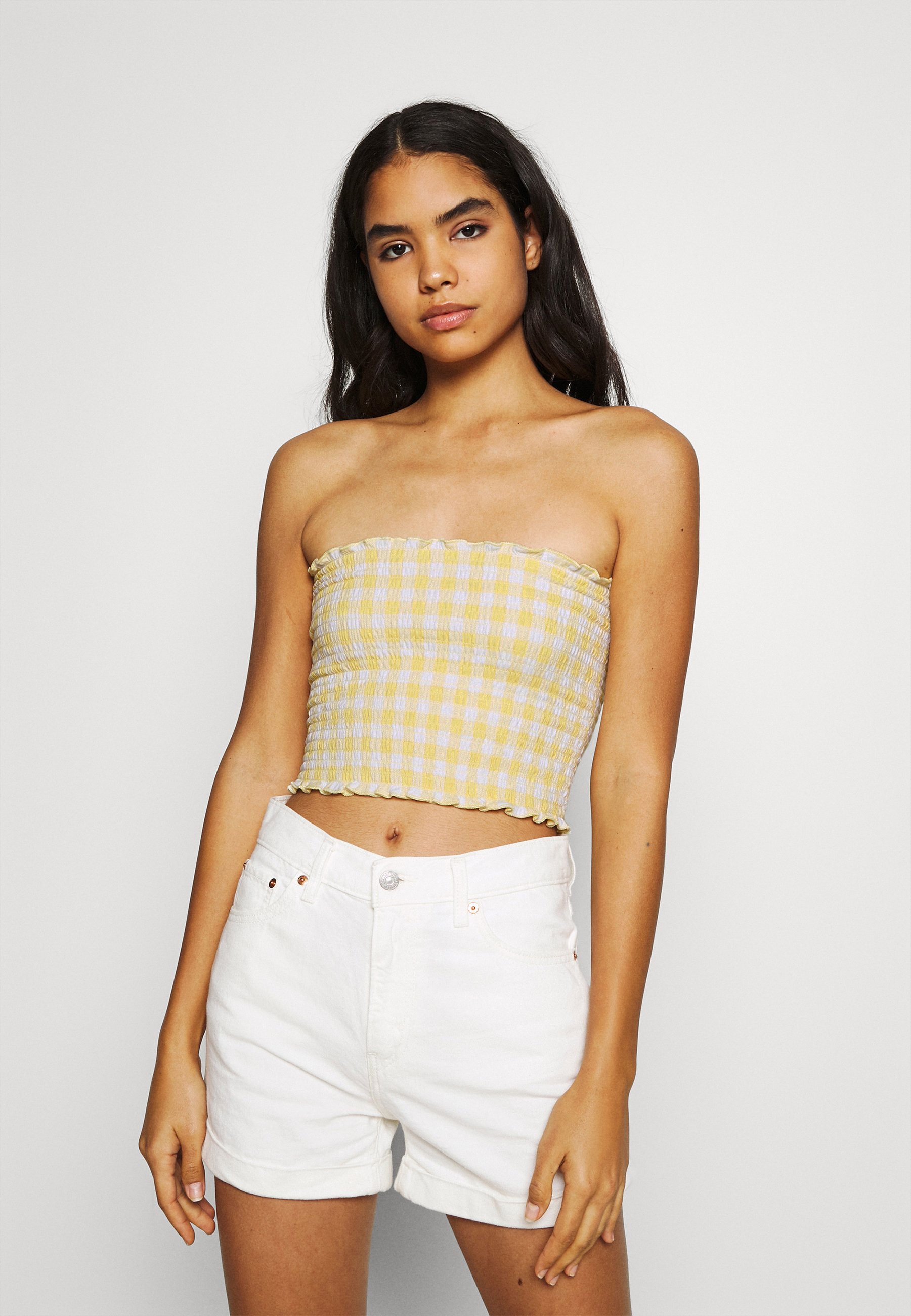 yellow smocked tube top