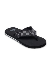 Tongs noires avec une bride en tissu à carreaux texturé, semelle en caoutchouc, et une bordure blanche accentuée. Présente un design à lanière entre les orteils pour un port facile.