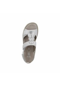 Light gray sandal with two wide straps and a textured circular accent. Soft interior, open toe, and a cushioned sole for comfort. Size 38.