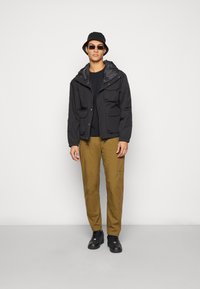 The North Face UTILITY RAIN JACKET - Impermeabile - black
