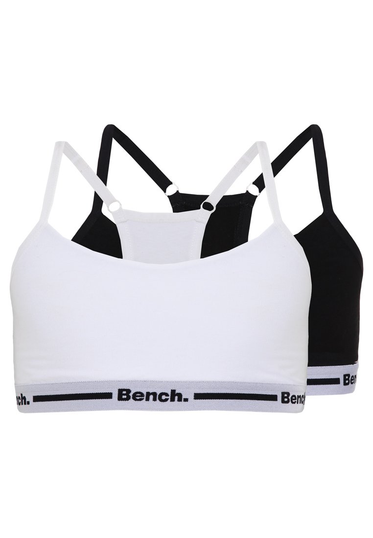 Zwei Bralettes in Weiß und Schwarz, aus dehnbarem Stoff. Jedes verfügt über dünne Träger und ein bedrucktes elastisches Band am unteren Rand.