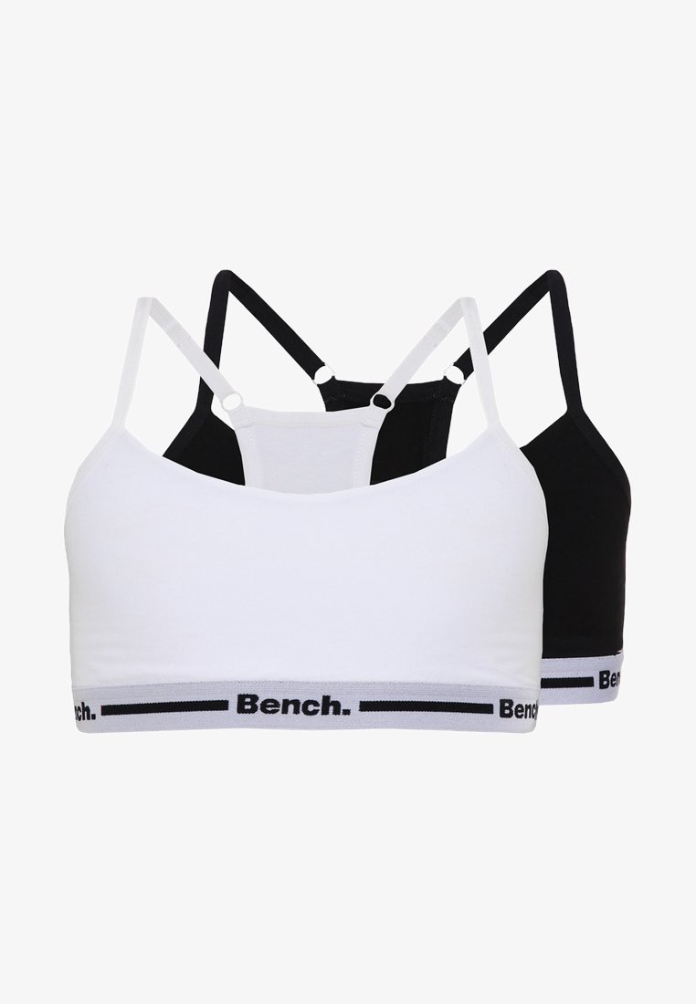 Zwei Bralettes in Weiß und Schwarz, aus dehnbarem Stoff. Jedes verfügt über dünne Träger und ein bedrucktes elastisches Band am unteren Rand.