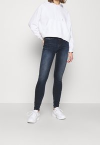 Tommy Jeans Jeans Skinny Fit - dark-blue denim
