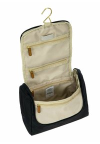 Borsa da toeletta nera con interno beige, dotata di numerose tasche zip in rete e opache, con dettagli in oro e un gancio per appenderla.
