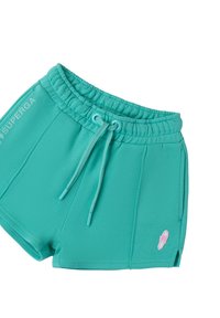 Pantaloni corti turchesi in felpa con vita elasticizzata, cordoncino e tasche laterali. Presentano un piccolo logo rosa sull'orlo. Tessuto morbido.
