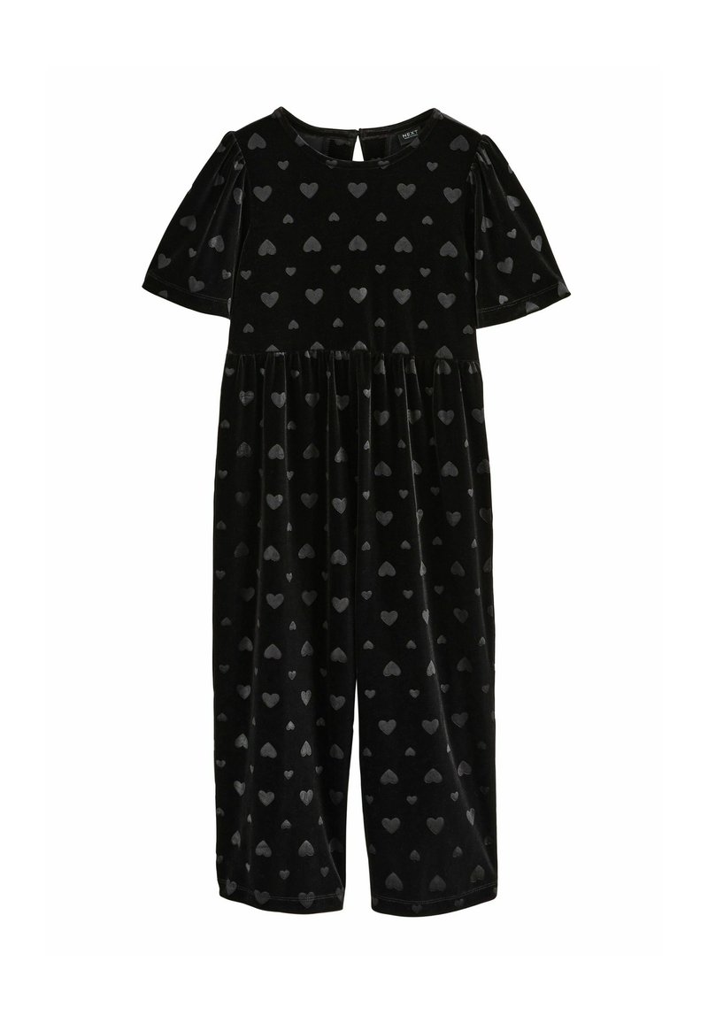 Zwart fluwelen jumpsuit met korte poffende mouwen, voorzien van een patroon van kleine grijze hartjes, en een ronde halslijn met een opening aan de achterkant.