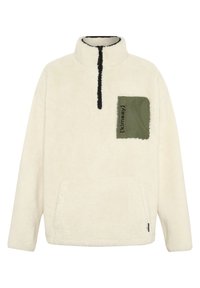Cremefarbener Fleece-Pullover mit einem Viertelreißverschluss-Kragen, vorderer Kängurutasche und einem olivgrünen Patch mit schwarzem Text. Schwarze Akzentnähte.