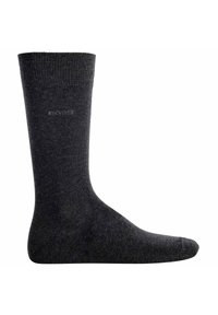 Graue Baumwollsocke mit ribbeltem Bündchen, verstärkter Spitze und dezentem Logo nahe der Oberseite. Glatte Textur und Knöchelhöhe.