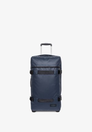 Borsone trolley blu navy con finitura lucida, caratterizzato da due cinghie nere, manico superiore e manico retrattile in alluminio.