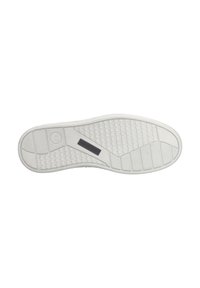 White rubber sneaker sole with textured grip pattern, circular and rectangular features, and a logo tag near the heel.