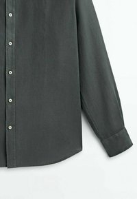 Dark gray long-sleeve button-up shirt made of soft fabric, featuring a classic collar, six buttons down the front, and rounded hem.