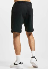 Rocawear CLEAN - Teplákové kalhoty - black