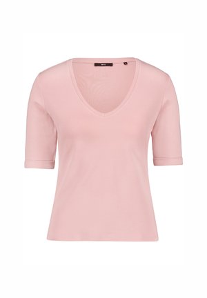 Chemise courte rose clair à manches courtes, col en V et manches retroussées, présentée sur un fond blanc.