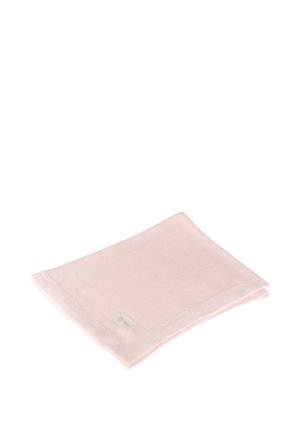 Soft pink folded knitted baby blanket with a small rectangular fabric label on one corner on a white background.