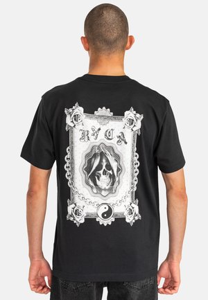 Black short-sleeve t-shirt featuring a detailed white graphic of a skull, roses, and a yin-yang symbol on the back.
